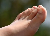 chodidla, reflexní masáž, bolesti páteře, prevence bolestí páteře